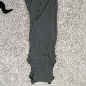 Fashion nova olive greens dress with a small slit